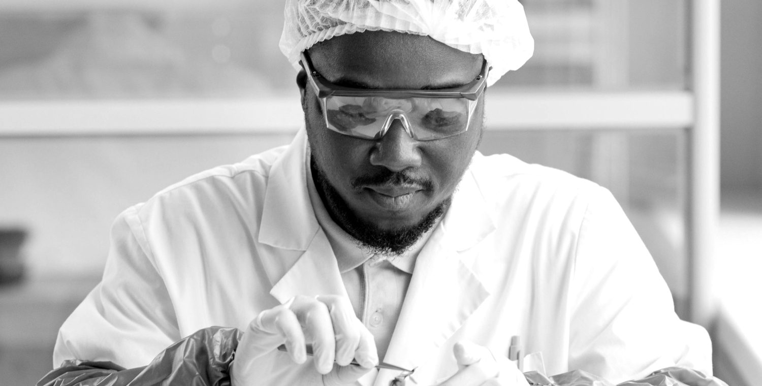 A NexGen laboratory technician working at the bench